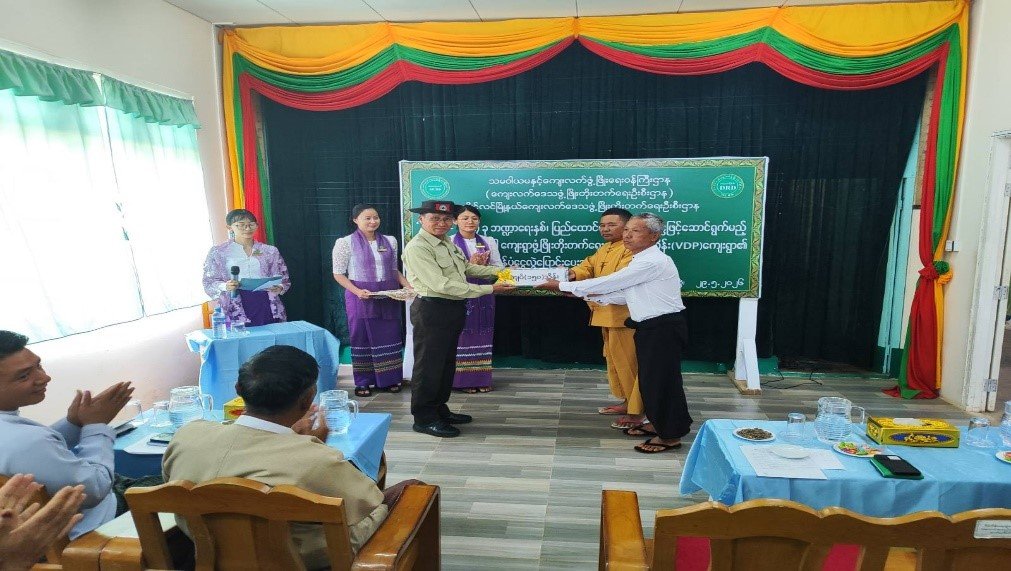 Attending the Village Development Project (VDP) fund transfer ceremony, to be implemented under the 100-Day Plan, held in Loilem, Loilem District, Shan State.